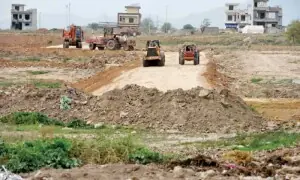 CDA clears 750 kanals of acquired land in Sector E-12
