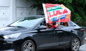 Supporters of Brazilian President Luiz Inacio Lula da Silva, the Workers' Party (PT) candidate for presidential re-election, drive by his residence, in Sao Paulo, Brazil on October 25, 2026. — Reuters
